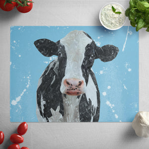"Harriet" The Holstein Cow (Blue Background) Glass Worktop Saver